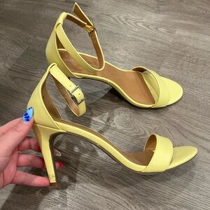 report yellow heels